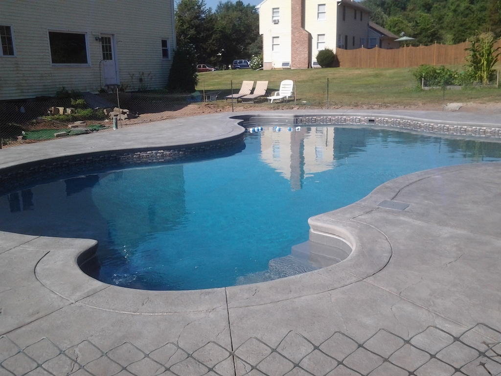 Swimming pool and stamped concrete project example 154